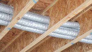 Duct bundle through precut I-Joists