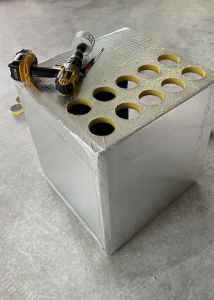 Ductboard manifold and hole saw tool